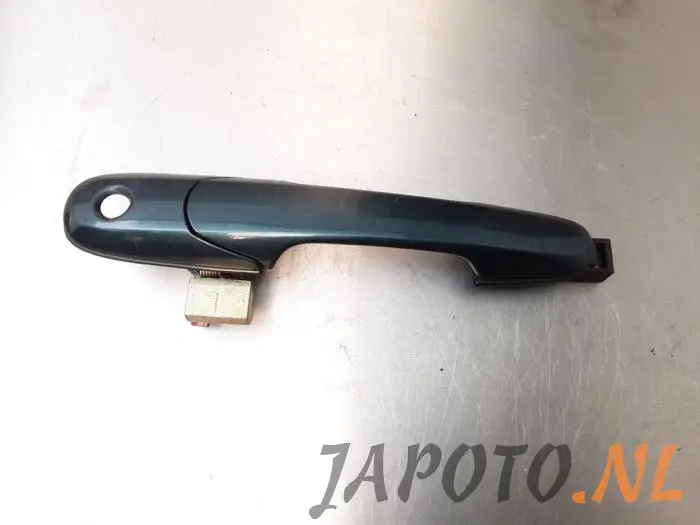 Door handle 4-door, front left Suzuki Liana