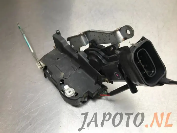 Front door lock mechanism 4-door, right Toyota Starlet