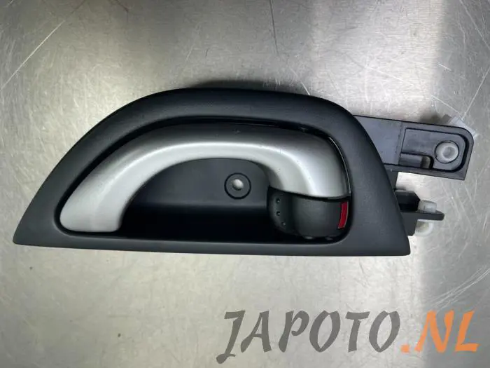 Rear door handle 4-door, left Honda Jazz