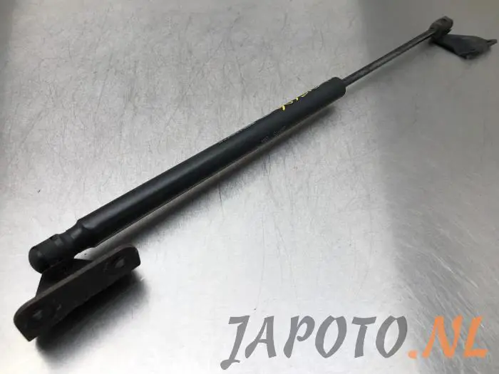 Rear gas strut, left Kia Carens