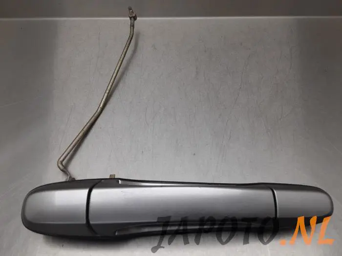 Rear door handle 4-door, left Toyota Previa