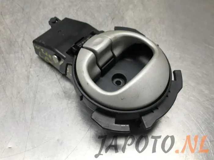 Rear door handle 4-door, left Daihatsu Trevis