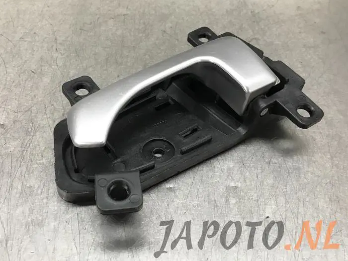 Door handle 4-door, front left Kia Sportage