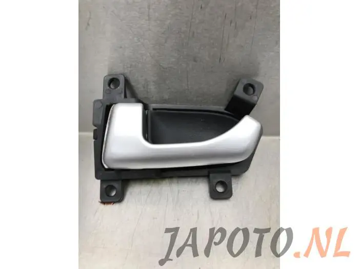 Door handle 4-door, front left Kia Sportage