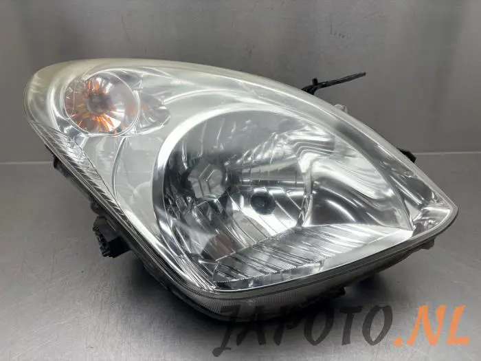 Headlight, left Nissan Pixo