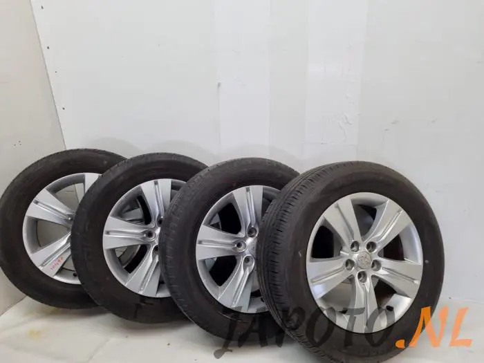 Sport rims set + tires Kia Sportage