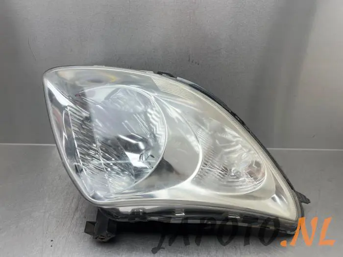 Headlight, left Suzuki Swift