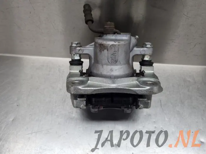 Rear brake calliper, left Toyota Rav-4