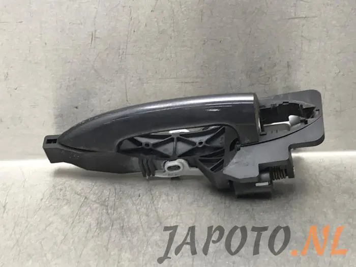 Rear door handle 4-door, left Kia Venga