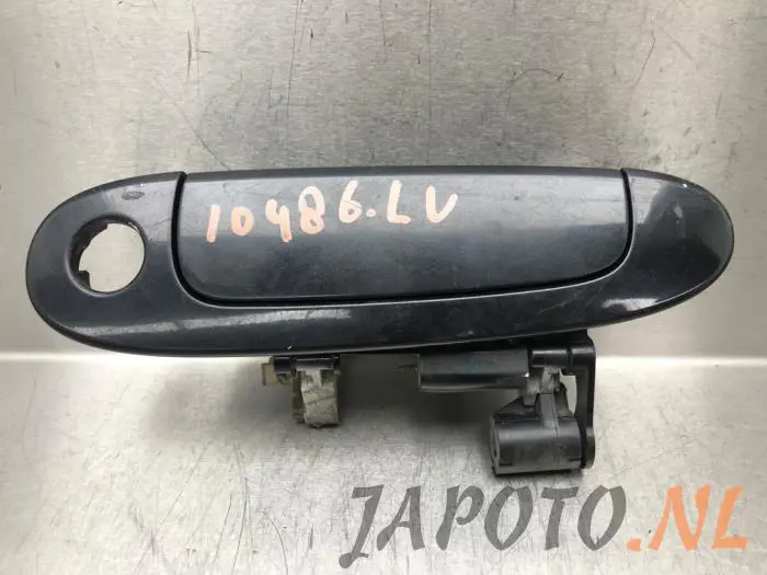 Door handle 4-door, front left Toyota Yaris