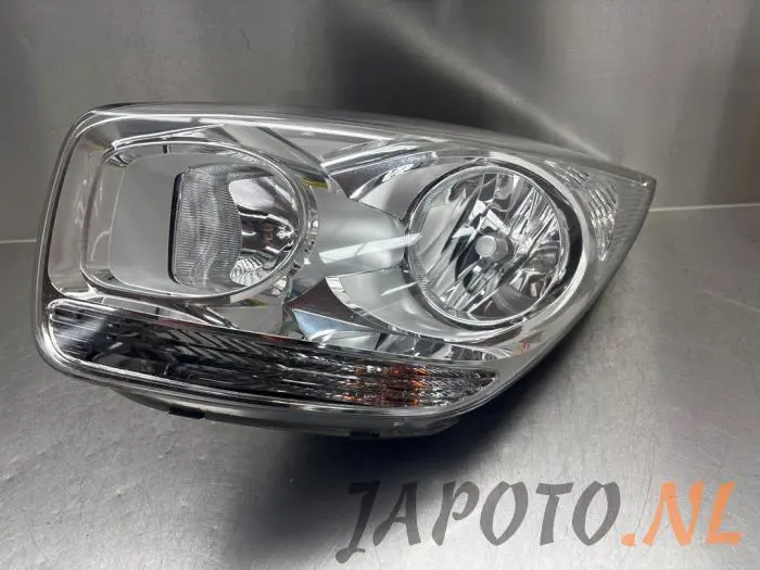 Headlight, left Kia Venga