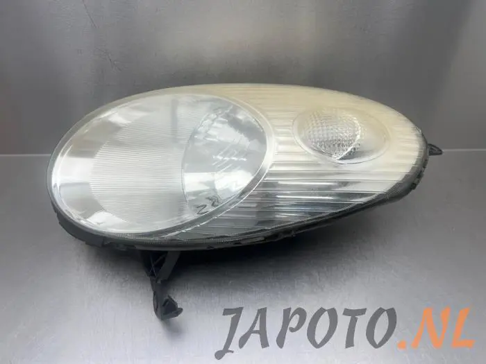 Headlight, left Nissan Micra