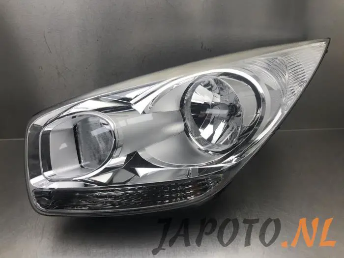 Headlight, left Kia Venga