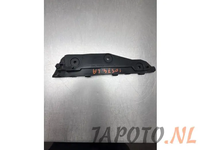 Rear bumper bracket, left Mitsubishi Colt