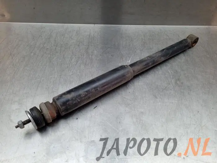 Rear shock absorber, left Suzuki Swift