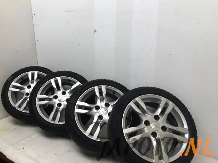 Sport rims set + tires Mitsubishi Colt