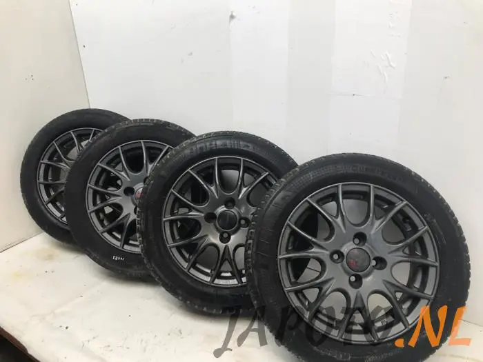 Sport rims set + tires Nissan Micra