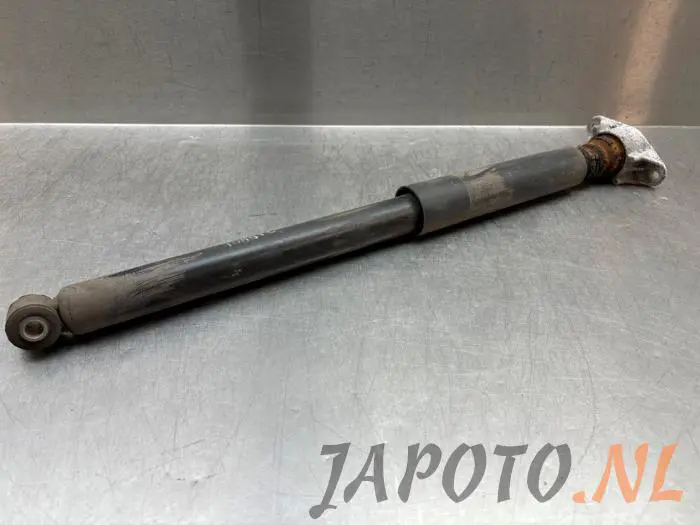 Rear shock absorber, left Mazda 3.