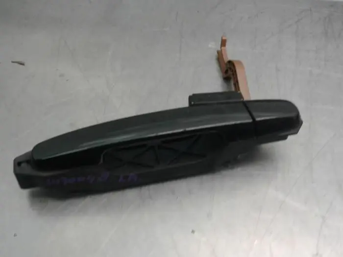 Rear door handle 4-door, left Daihatsu Sirion