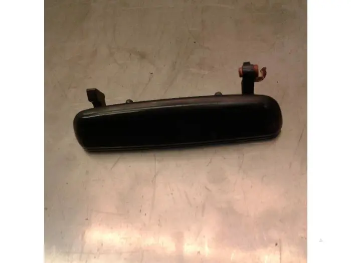 Door handle 4-door, front left Mazda Demio